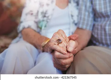 cropped-shot-elderly-couple-holding-260nw-421367545