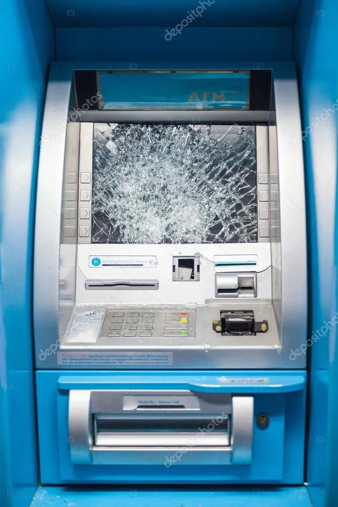 depositphotos_52478445-stock-photo-smashed-atm